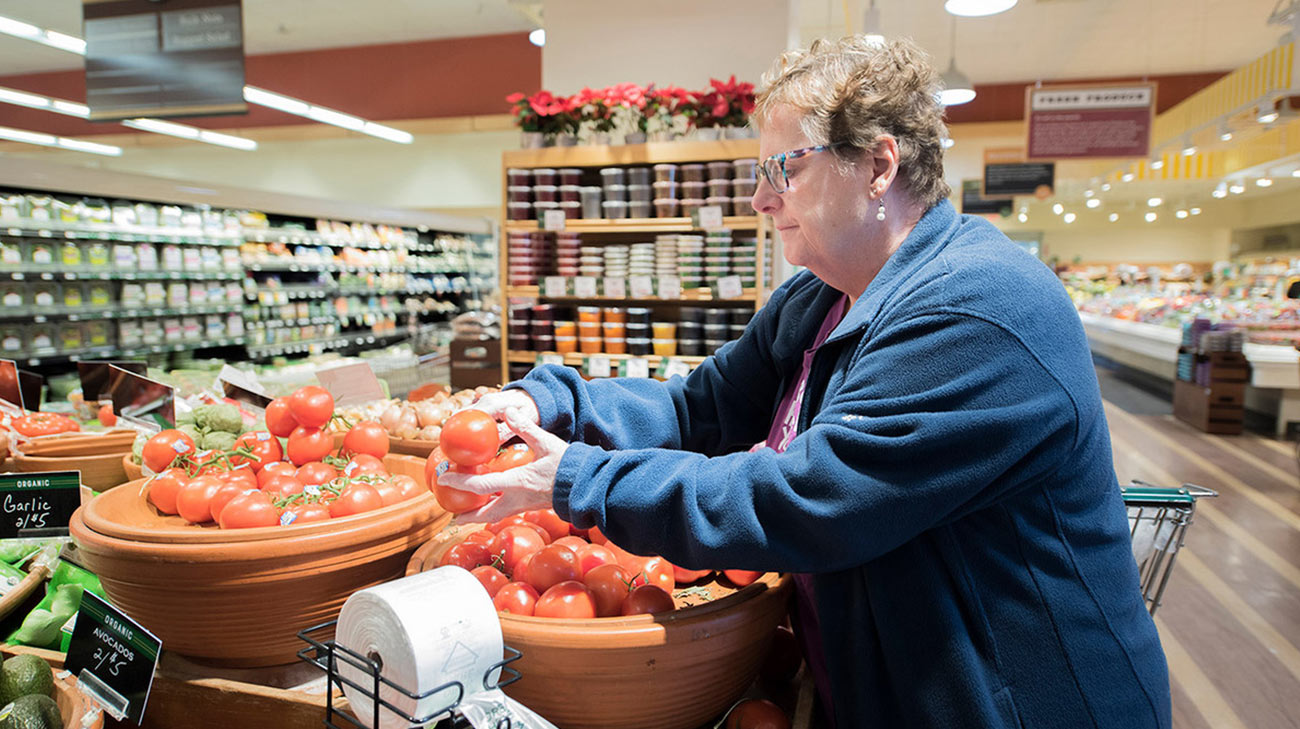 Pat Baskins shopping for vegetables