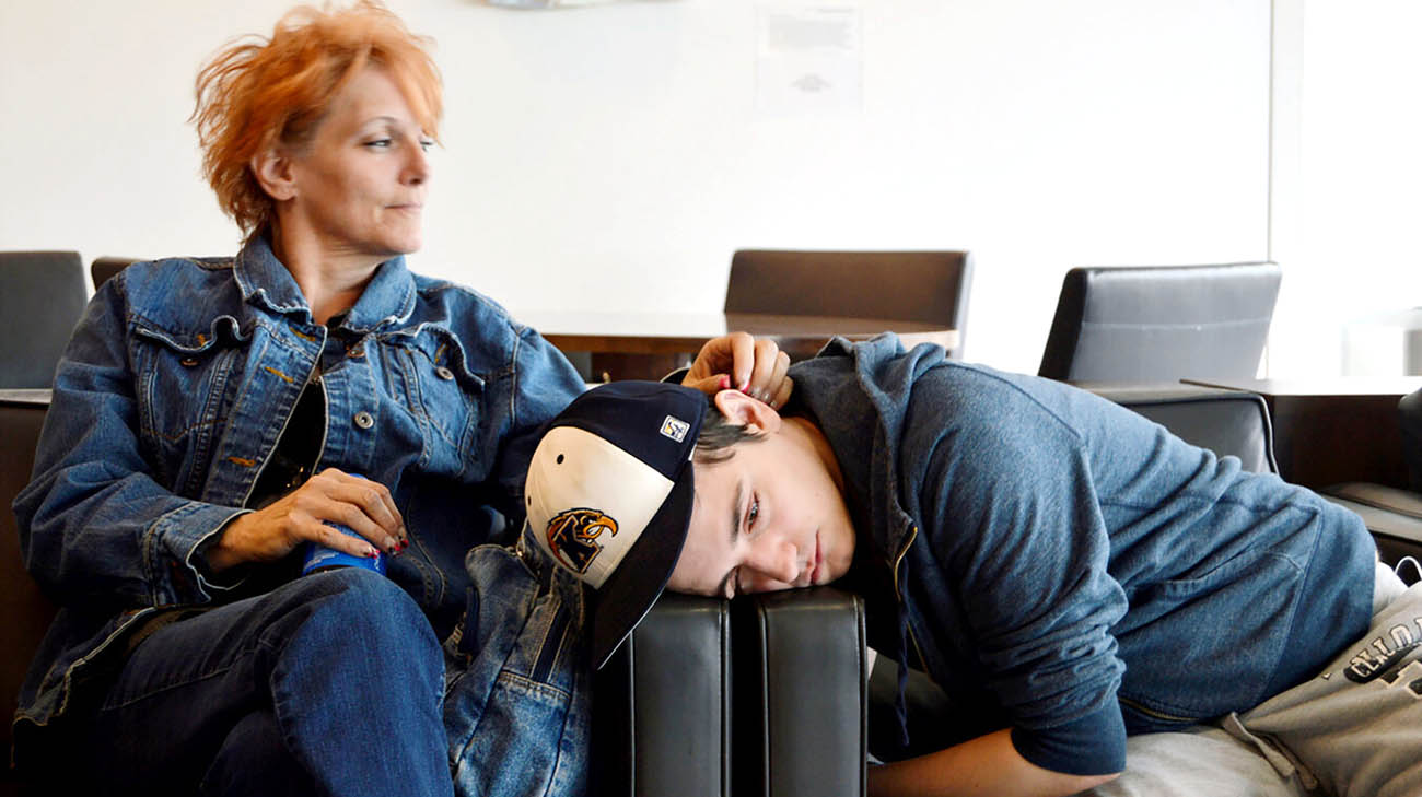 Nick Hunter with his mother waiting to be listed for a lung transplant. 