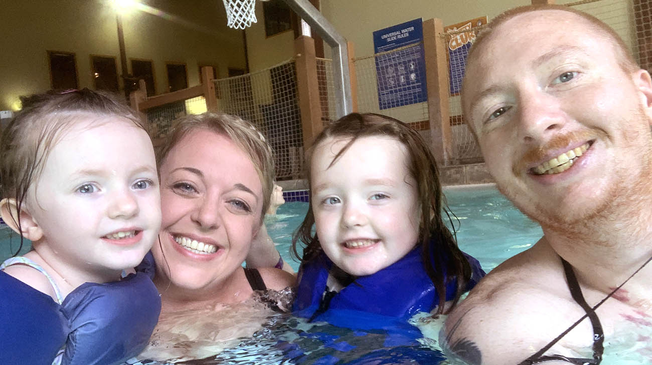 Maya and her family at an indoor waterpark. 