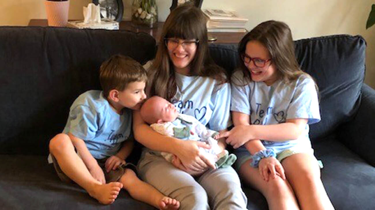 Patrick meeting his siblings for the first time. (Courtesy: Meghan LaFraniere)