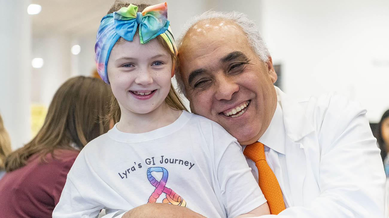 Lyra and Dr. Kareem Abu-Elmagd at Cleveland Clinic, on Intestinal Malrotation Awareness Day. 