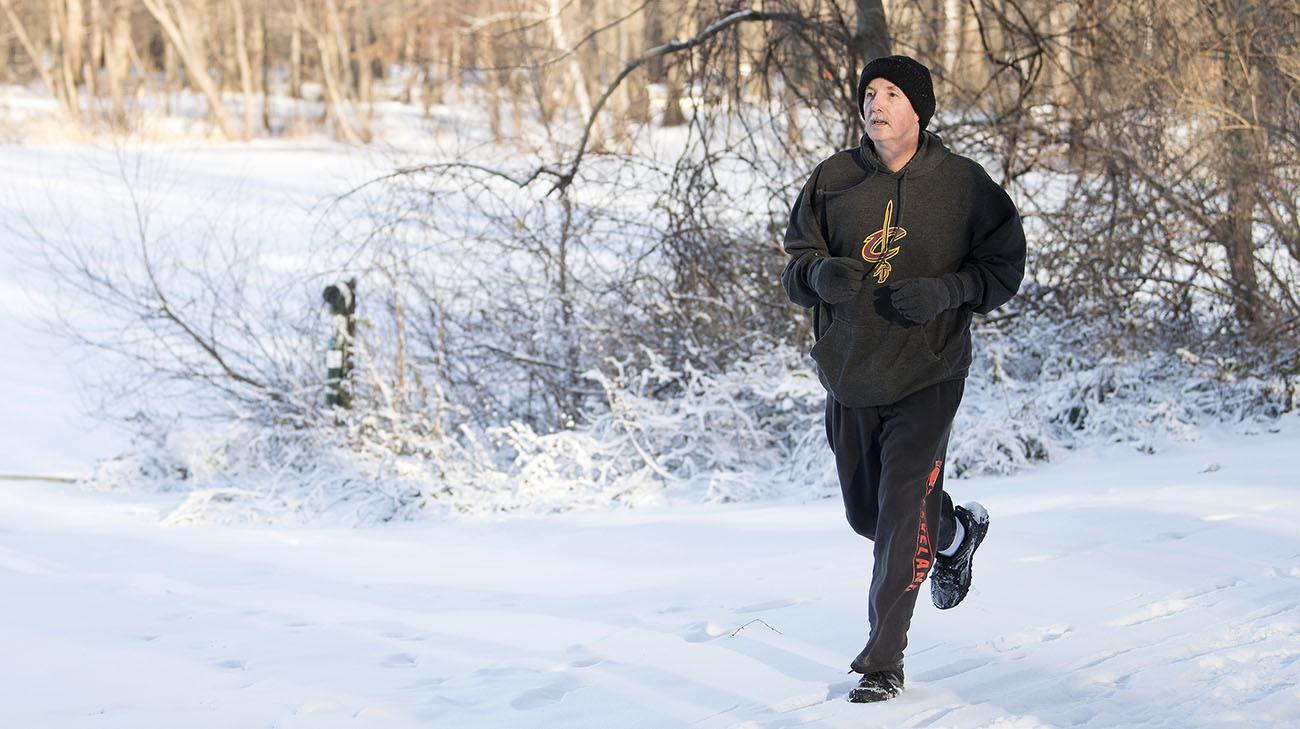 Jay continues to train for long-distance runs in the middle of winter. (Courtesy: Cleveland Clinic)
