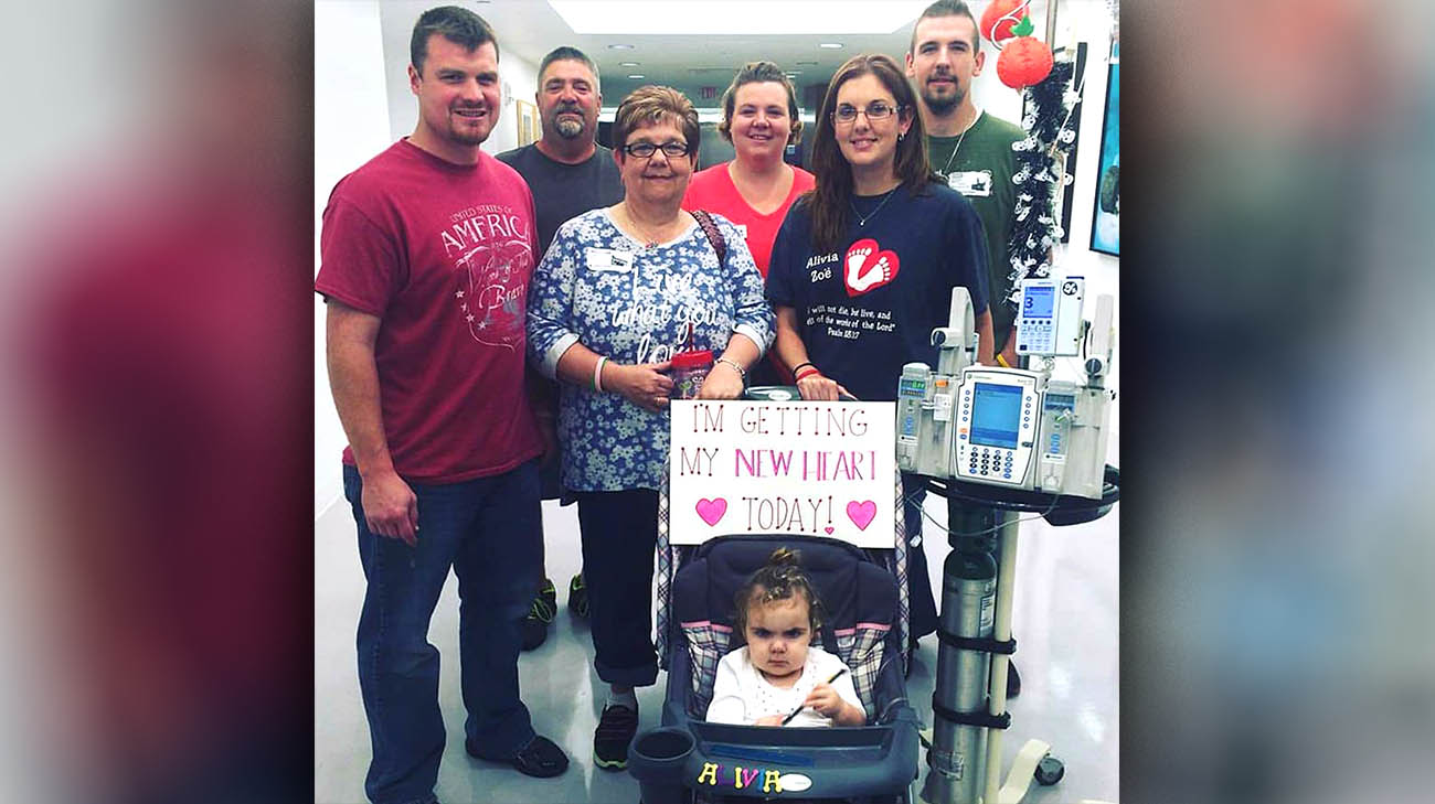 Alivia and her family gathered at Cleveland Clinic Children's before she underwent a heart transplant.