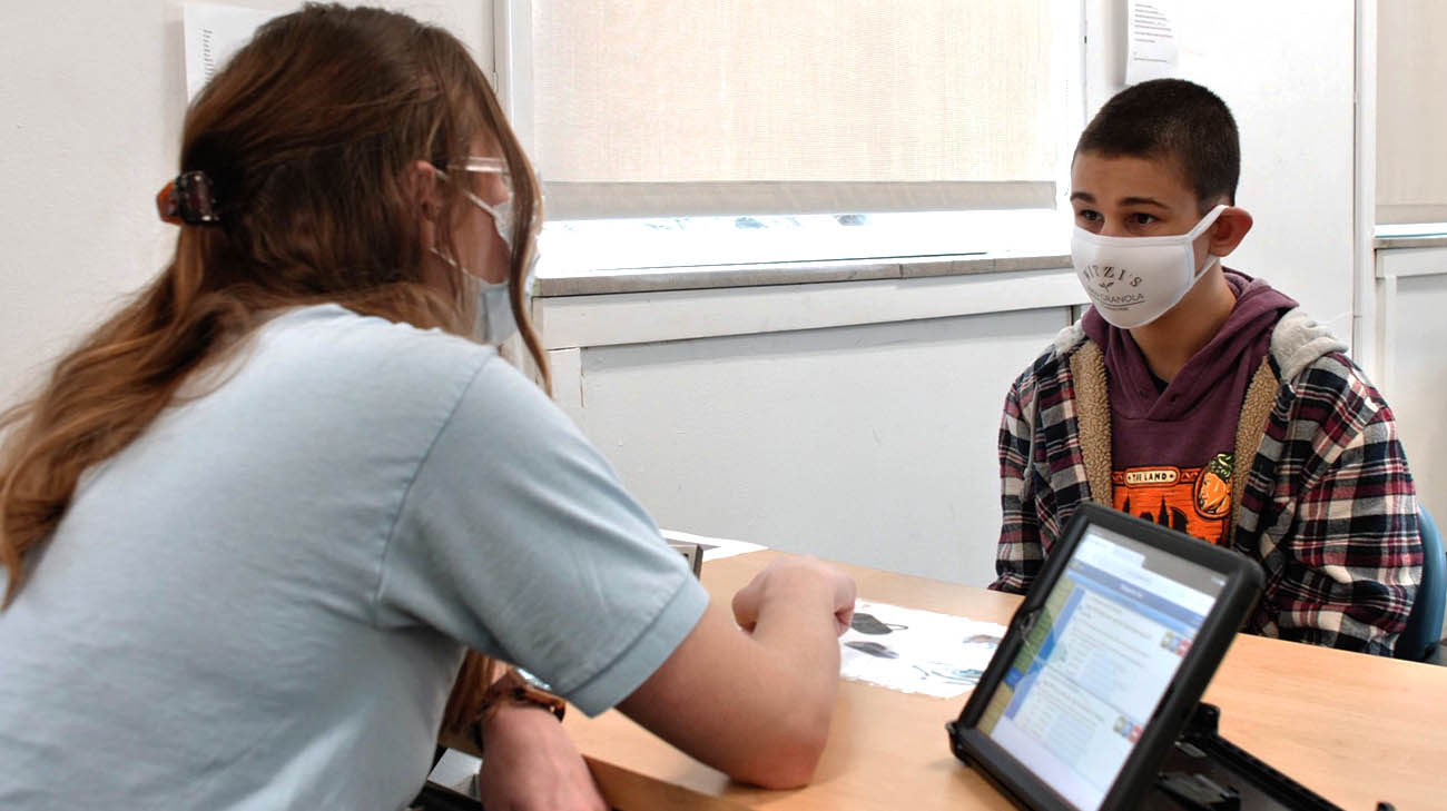 Paul with his teacher, Morgan, at Cleveland Clinic Children's Lerner School for Autism. 