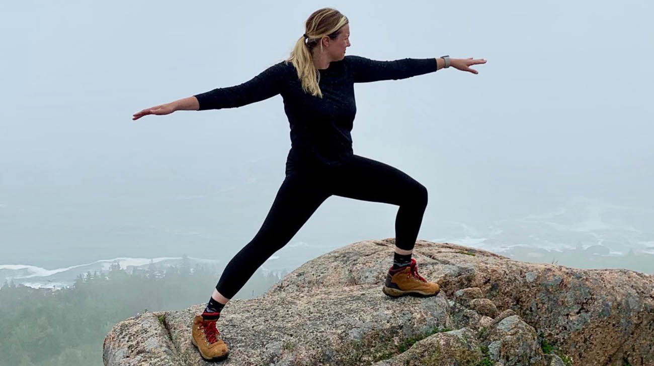 After treatment for melanoma, Caitlin is back doing the things she loves, including hiking and yoga. 