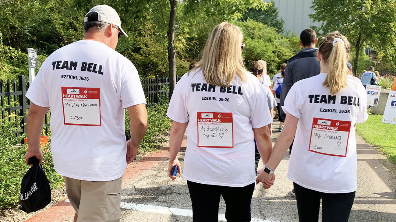 Denise, her husband Brad, and Ashton, at a heart walk. 