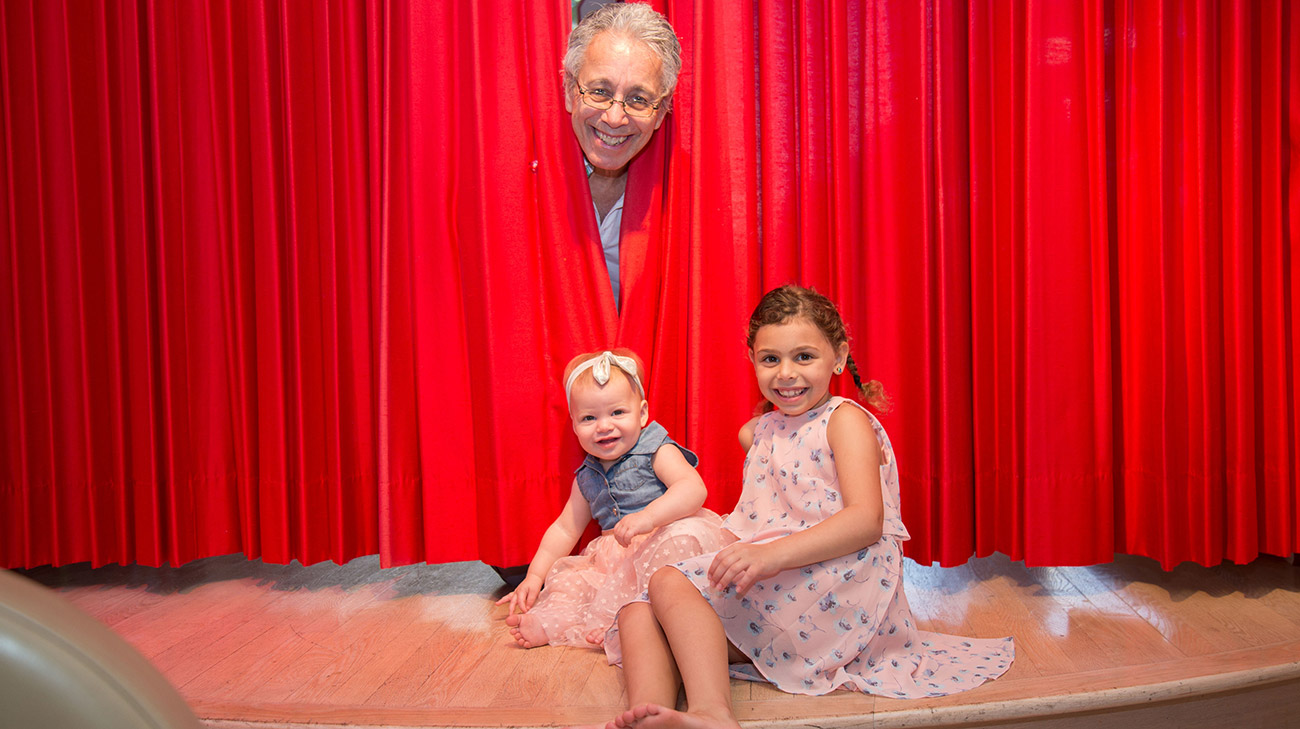 Chas on stage with Stella and Sophia