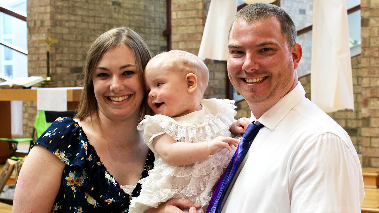 Charlotte, her mom Bethany, and dad, Zeb.