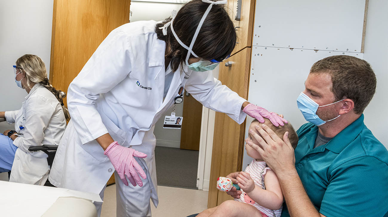 Dr. Bassiri with Charlotte during one of her follow-up appointments. 