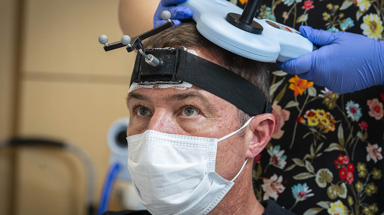 Joe receiving therapy after undergoing deep brain stimulation.