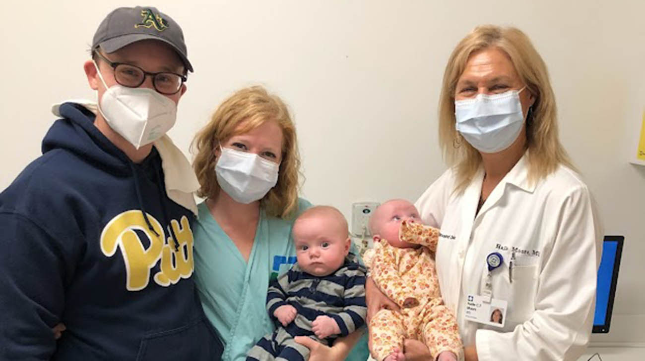 Katie, Craig, the twins and Dr. Halle Moore, at Cleveland Clinic. 