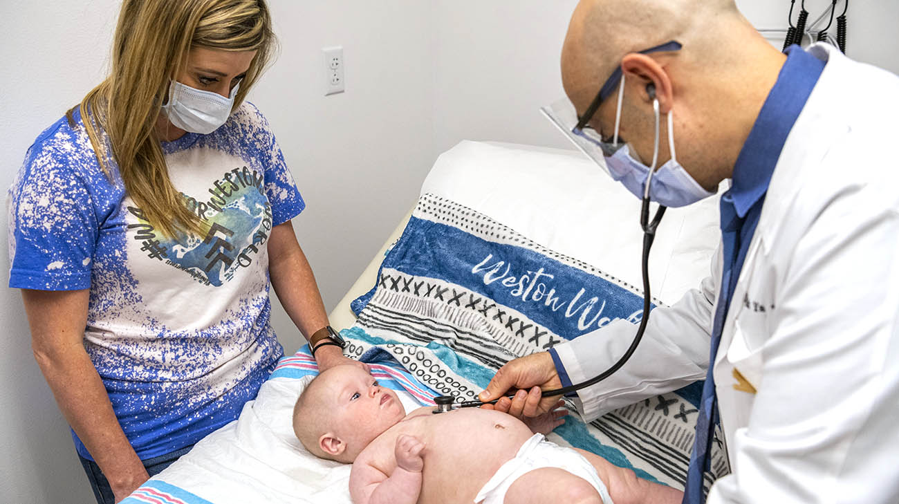 Cleveland Clinic Children's pediatric cardiologist Dr. Malek Yaman during a follow-up visit with Weston. 