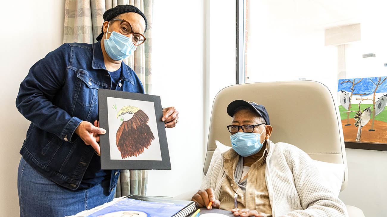 Ned with his wife, Terry, during an art therapy session. 