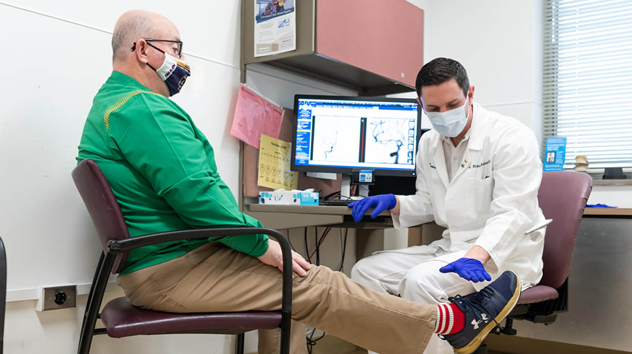 Neil Freeman during a follow-up appointment with Dr. Gaber Toth after experiencing a stroke. 