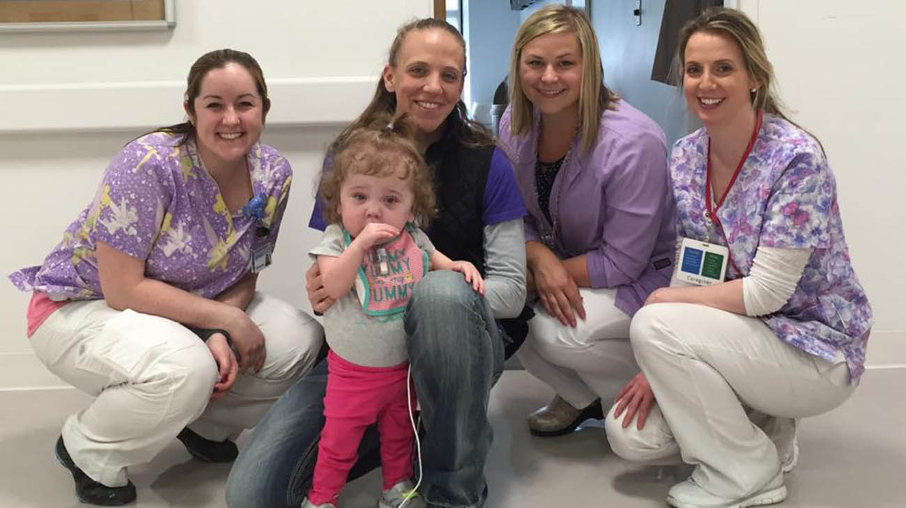 Jacoby with caregivers at Cleveland Clinic Children's.