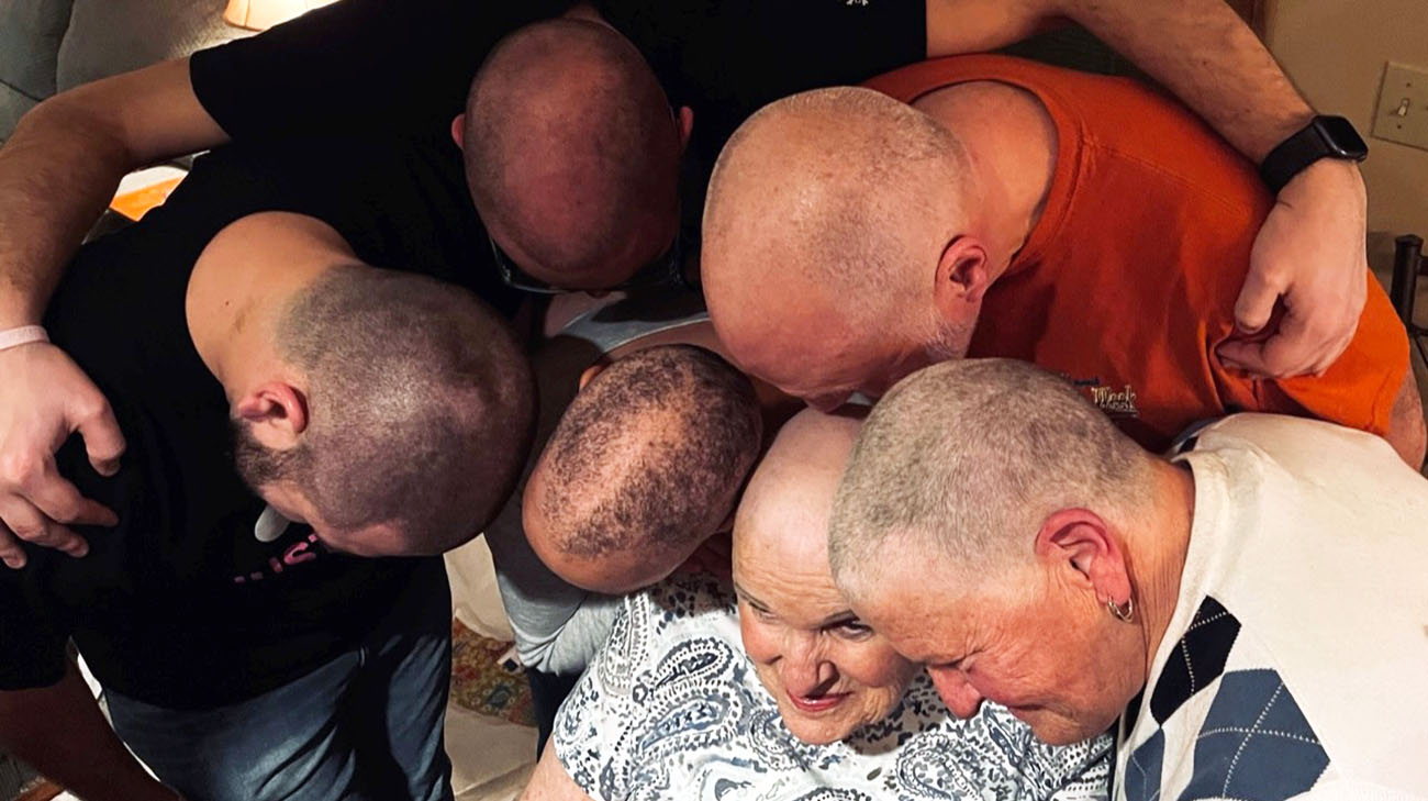 Stephanie's family and friends had a head shaving party for her. 