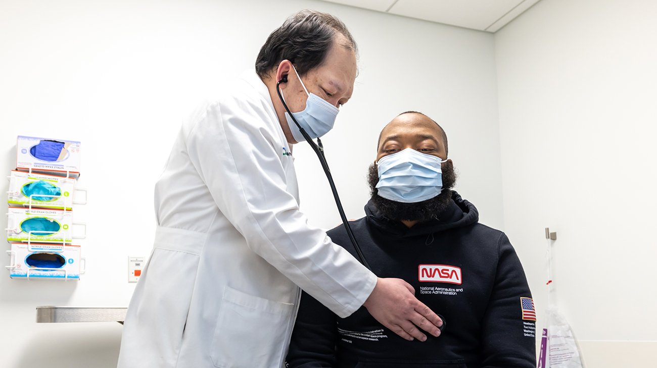 Patient Robert Terry with Dr. Alvin Wee at a follow-up appointment