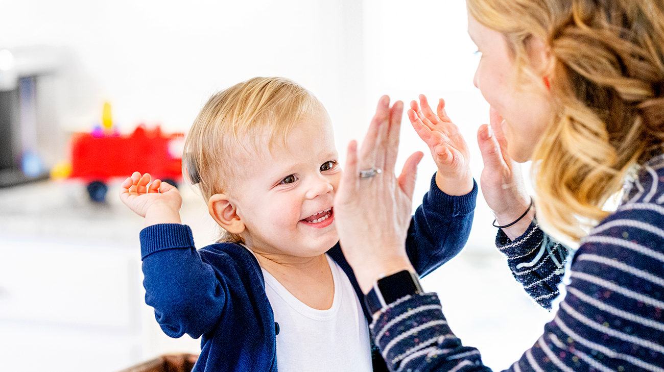 Corbin and his mom playing.