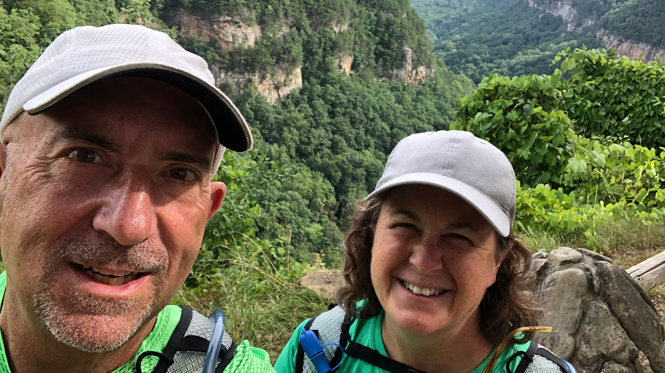 Dan Walden enjoying a hike with his wife, Perri.