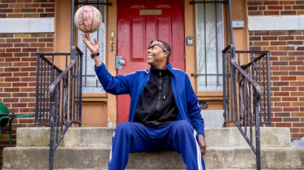 Roy Humphrey spins a basketball on his finger.