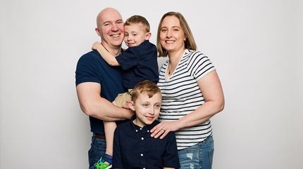Carolyn Garrott pictured with her husband, Matt, and two sons, including William.