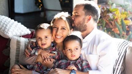 Andrea Castellanos with her two sons and her husband.