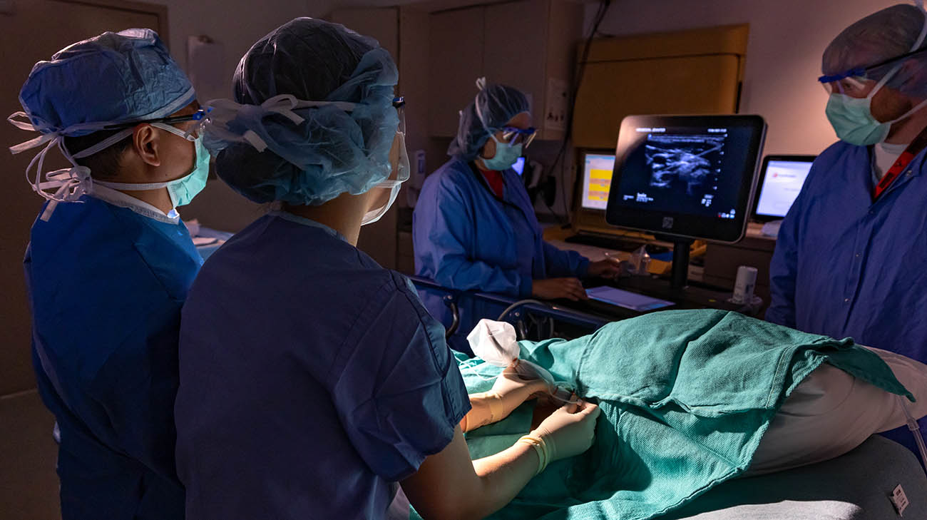 Doctors perform a procedure where pain injections are inserted into a patient's neck to restore senses lost from long COVID. 