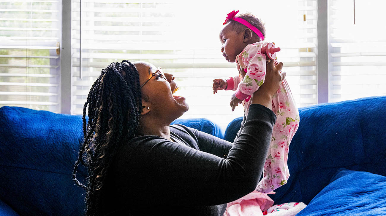 Breona with her daughter, Journee, at home. 