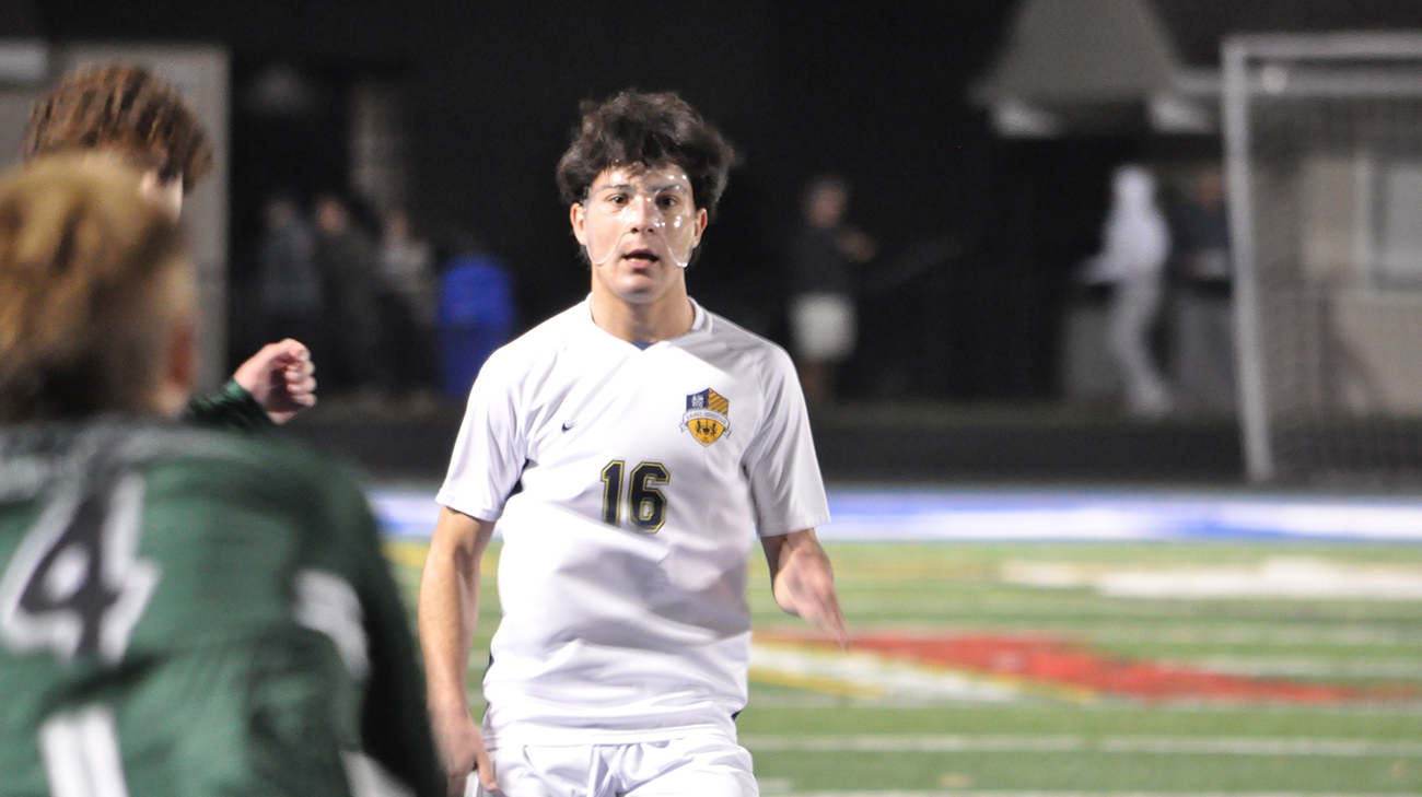 Philip Vlastaris, Cleveland Clinic patient, wearing his protective facial mask during a soccer game.