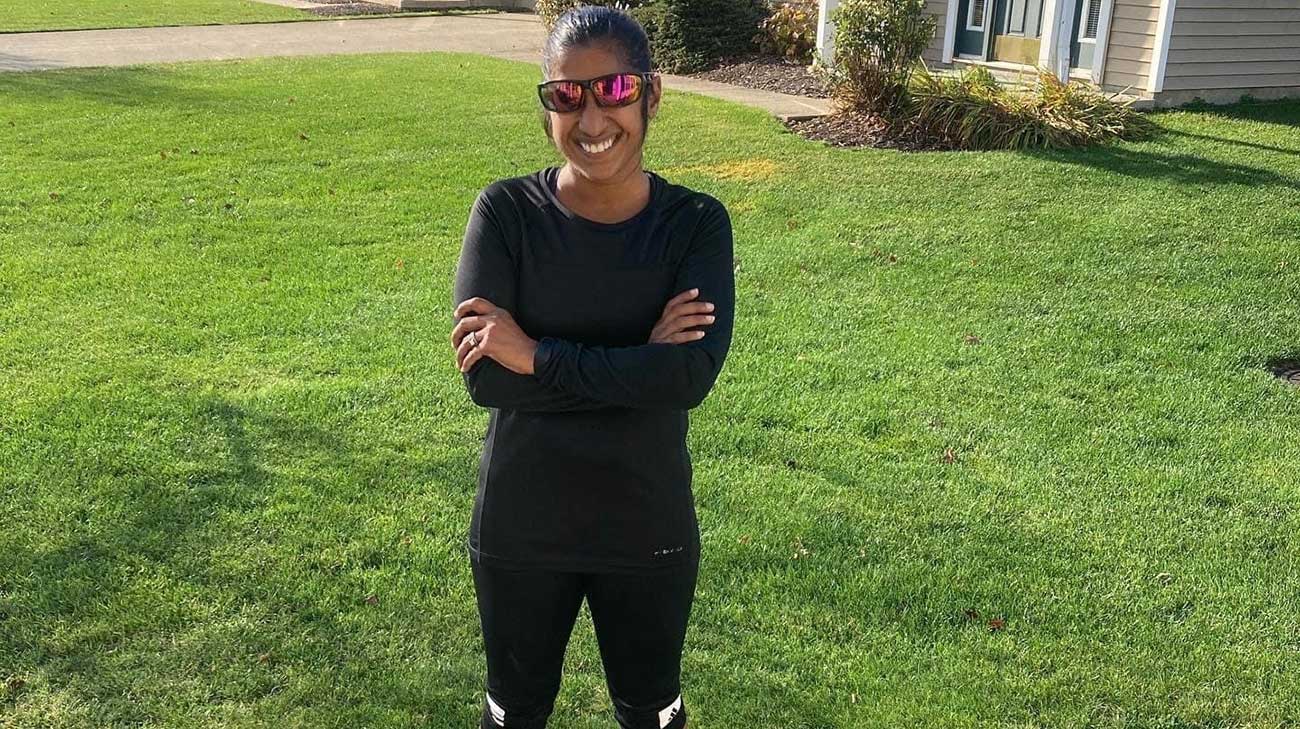 Emily Baddorf standing outside in running gear