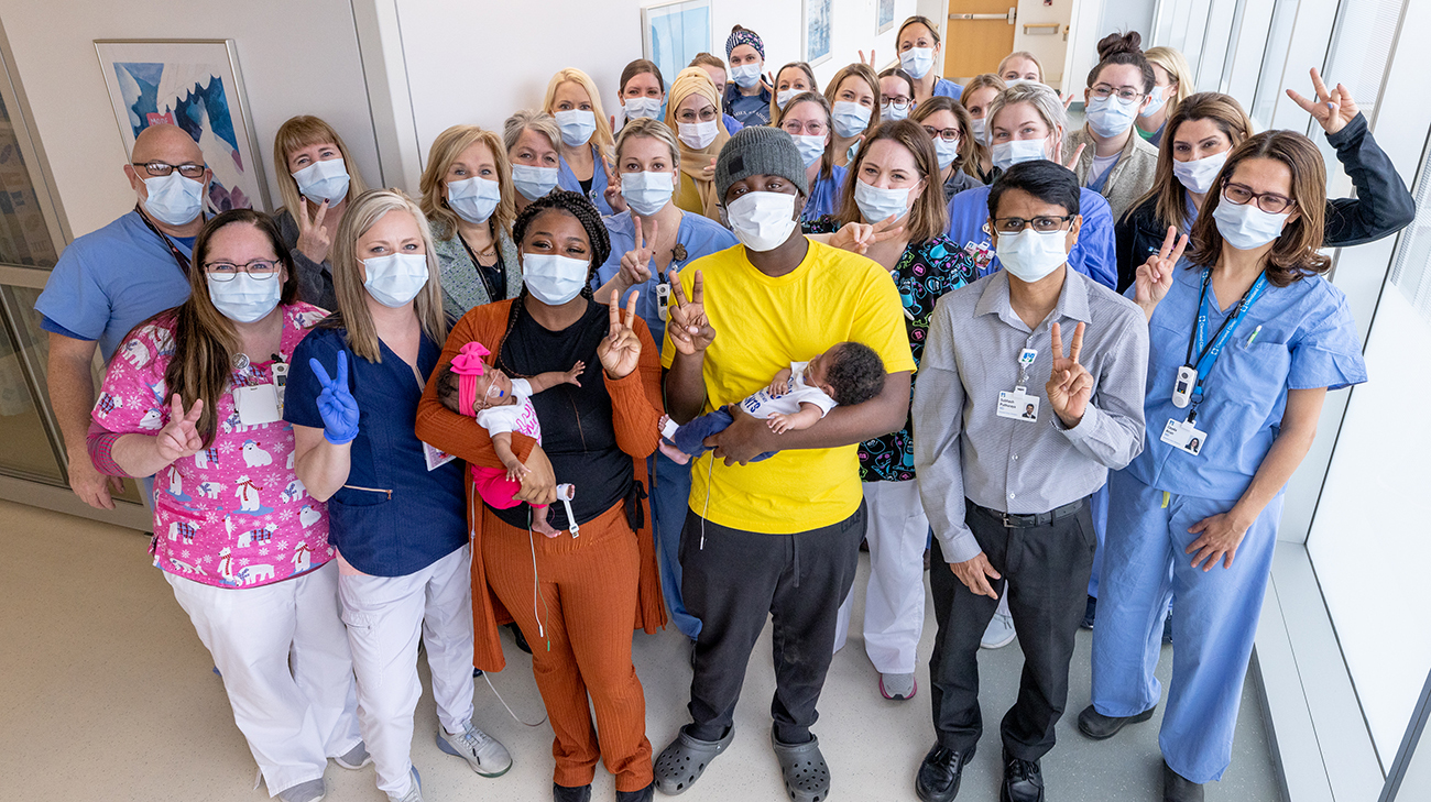 Kimberly, Damante, Kimyah and DJ with their care team at Cleveland Clinic Hillcrest Hospital. 