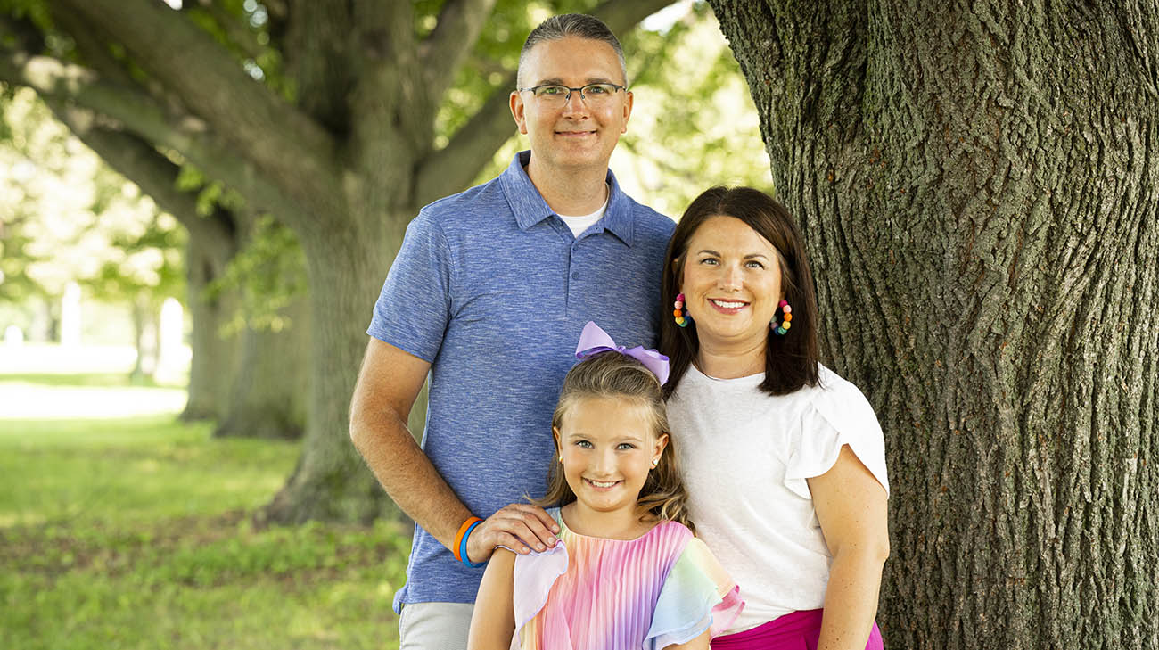 Audrey with her mom, Nicole, and dad, Bill. 