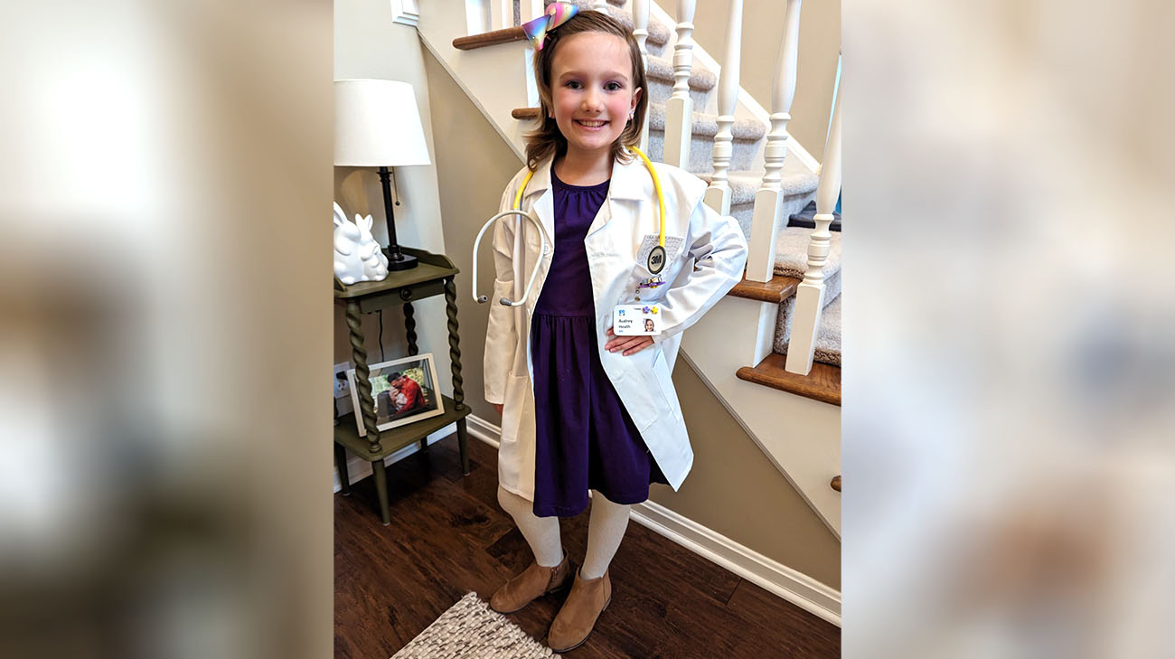Audrey wants to be a doctor when she grows up so she can take care of patients like her. 