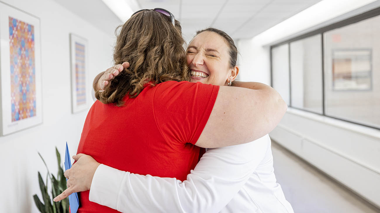 Bianca hugging one of the nurses on her care team during return visit to Cleveland Clinic. 