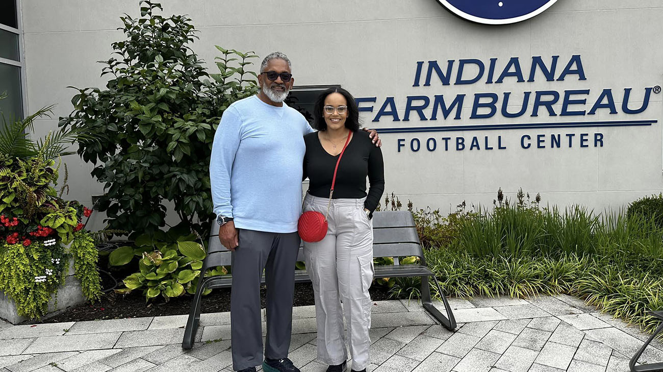 Chris with his daughter, Kitty, at the Indiana Farm Bureau Football Center. 