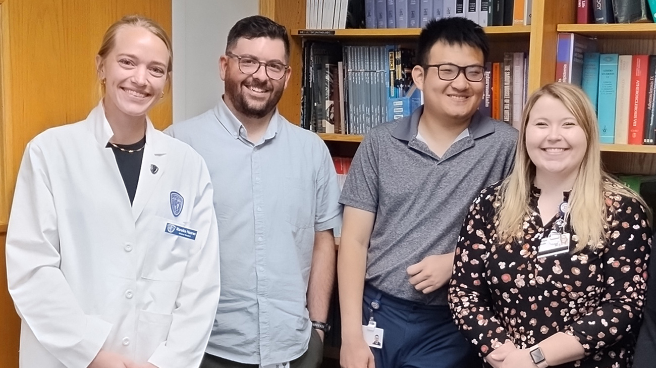 Andras with fellow research students.