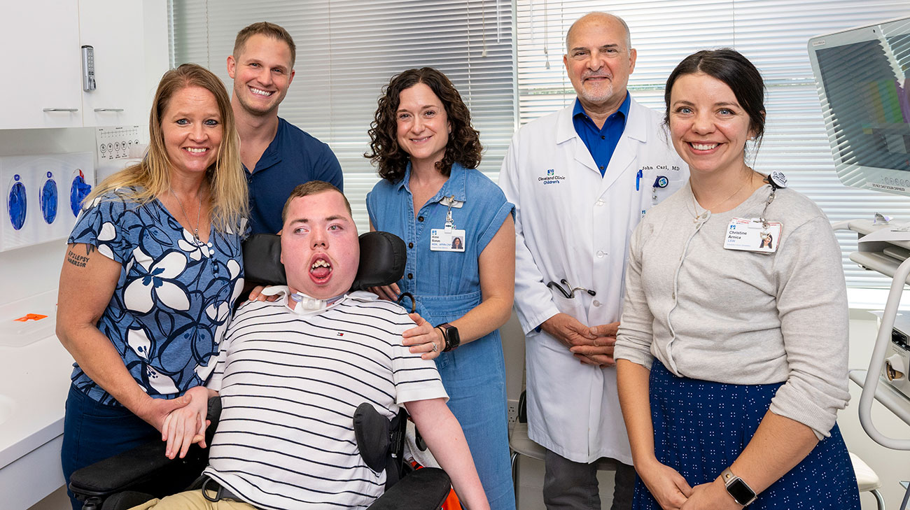 Alex with his family and some PCAVS team members from Cleveland Clinic Children's.