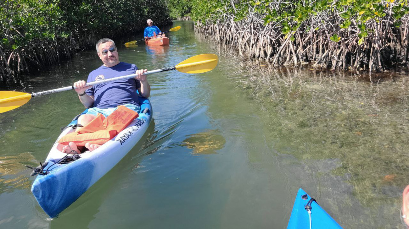 Jay Trevino paddling a kayak.