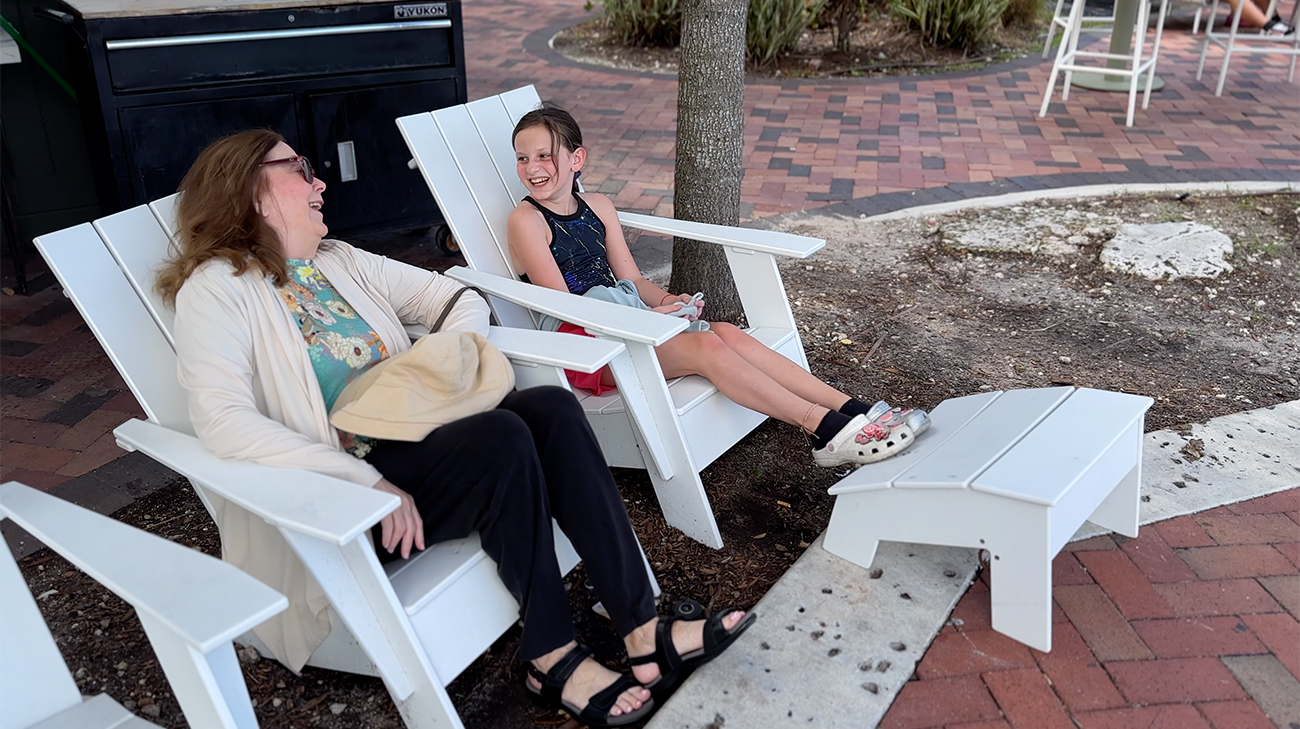 Susan sitting with family