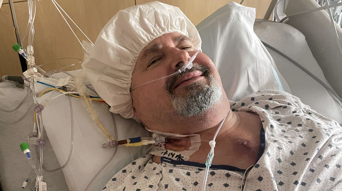 Recovering from open-heart surgery, Ernie finds relief with a special shampoo cap that soothes his itchy scalp, proving that even small comforts make a big difference on the road to healing.