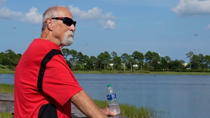 John Holcomb enjoying his view on a walk outdoors.