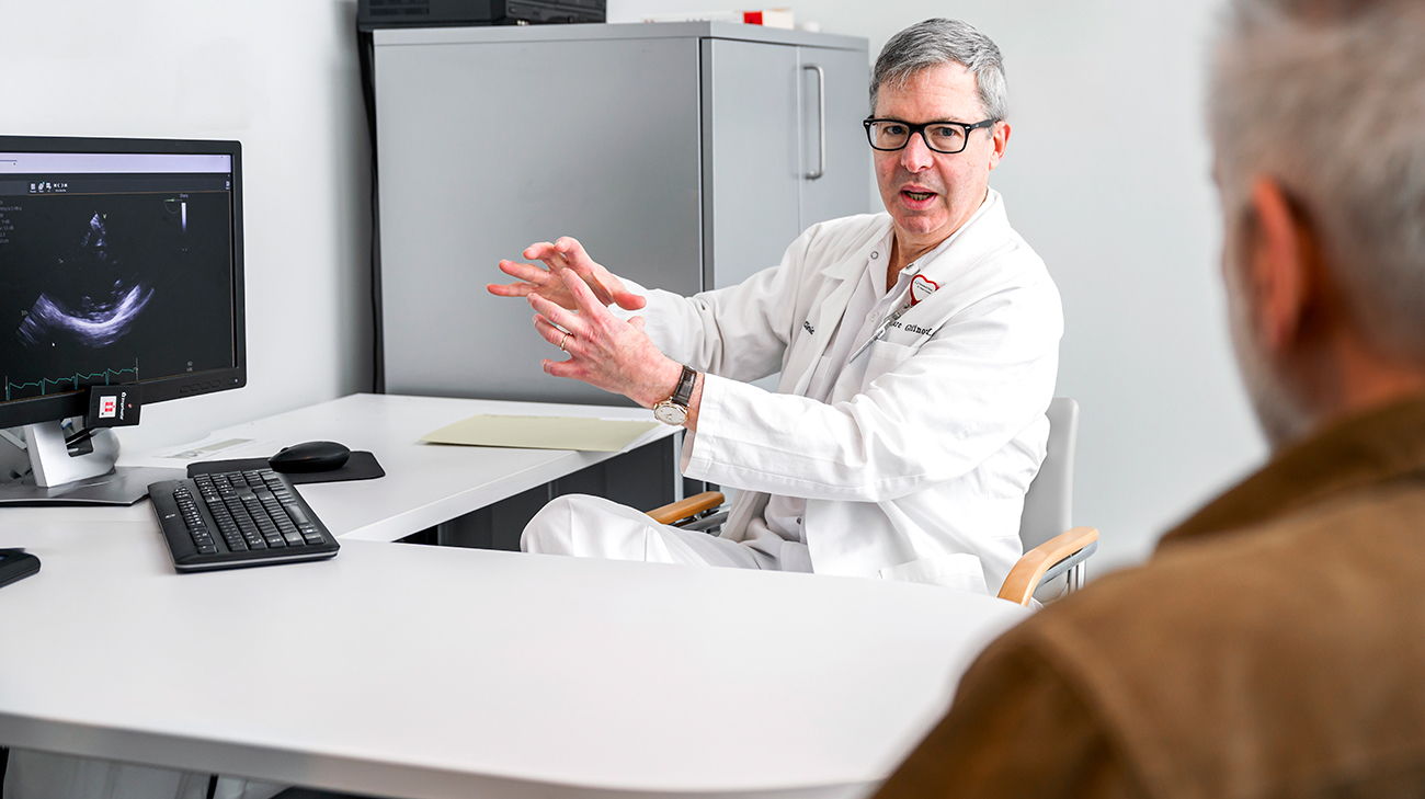 Dr. Marc Gillinov talking to Rick at an appointment