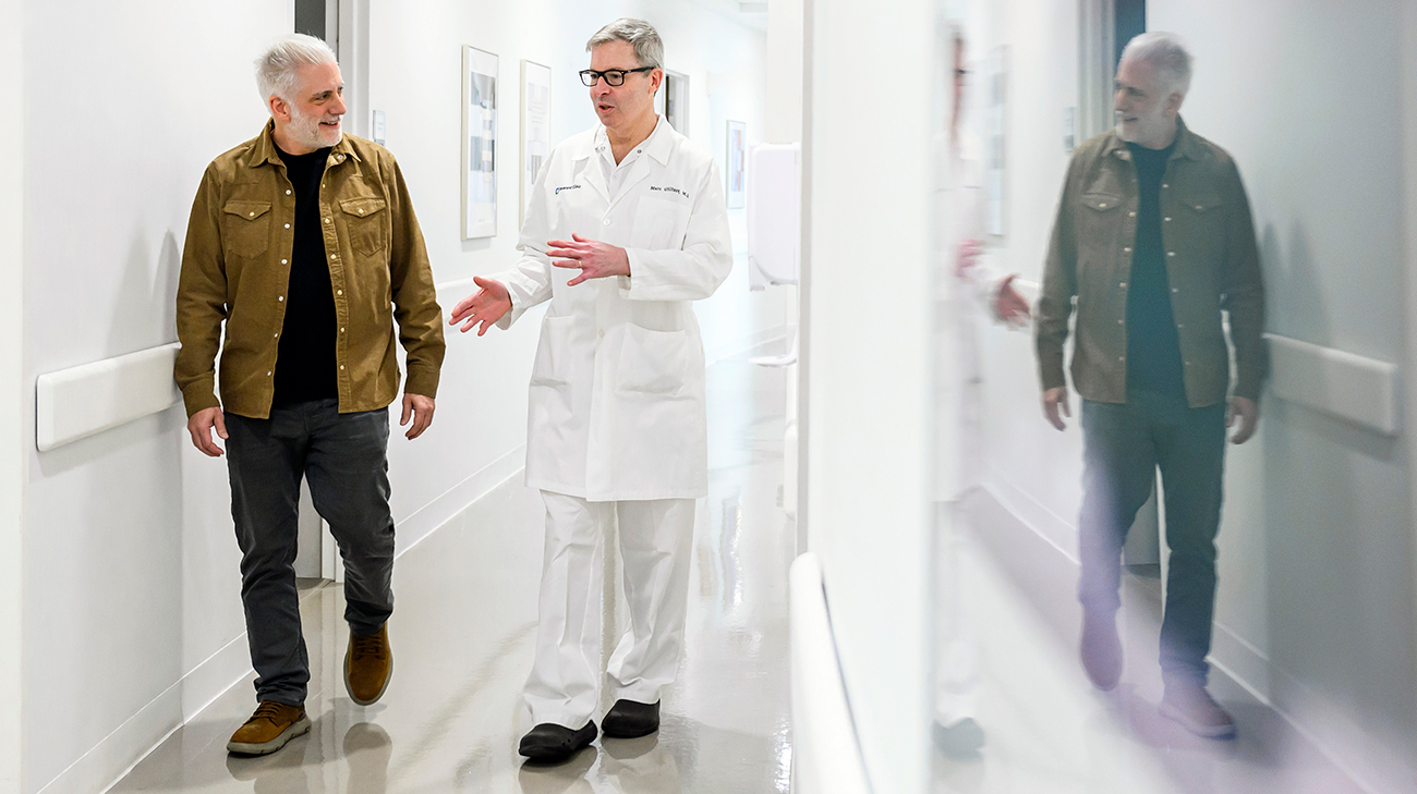 Dr. Marc Gillinov walking and talking with Rick