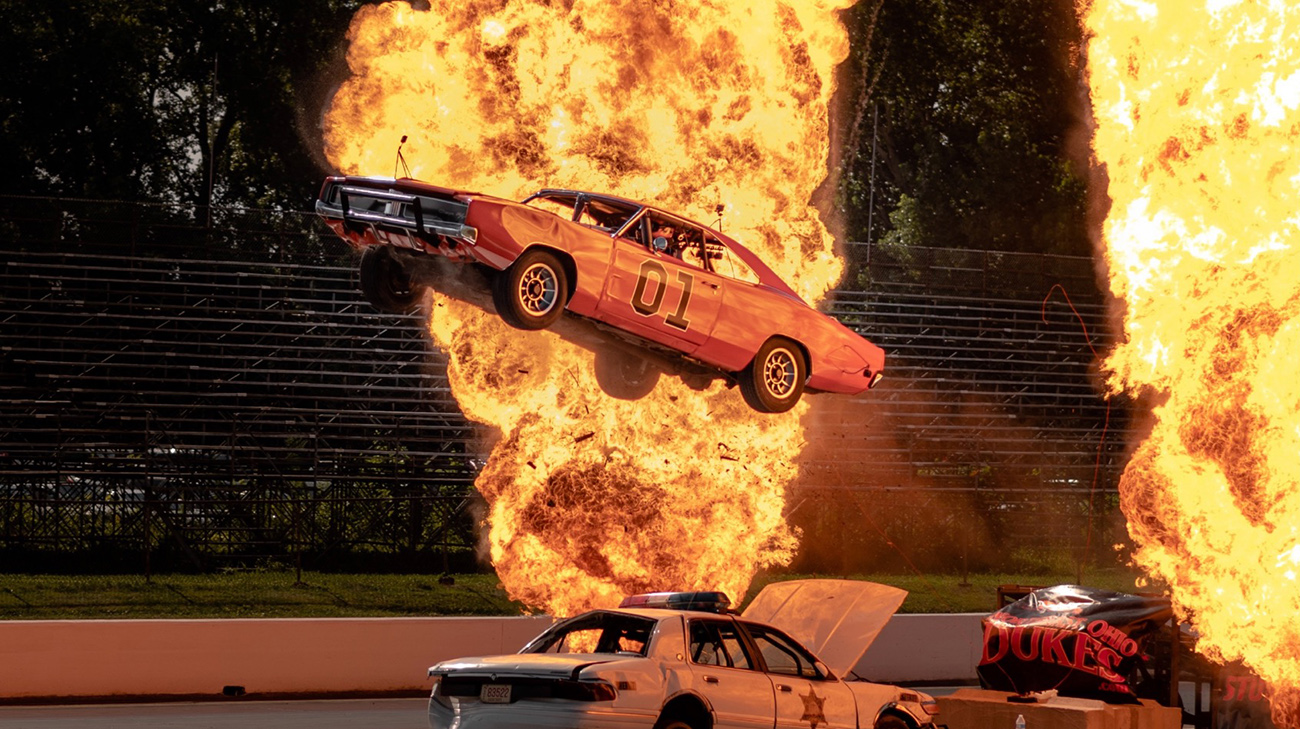 Raymond performs eye-popping ramp-to-ground stunt jumps in replicas of the orange Dodge Charger showcased in the popular 1980s television series “The Dukes of Hazzard.”