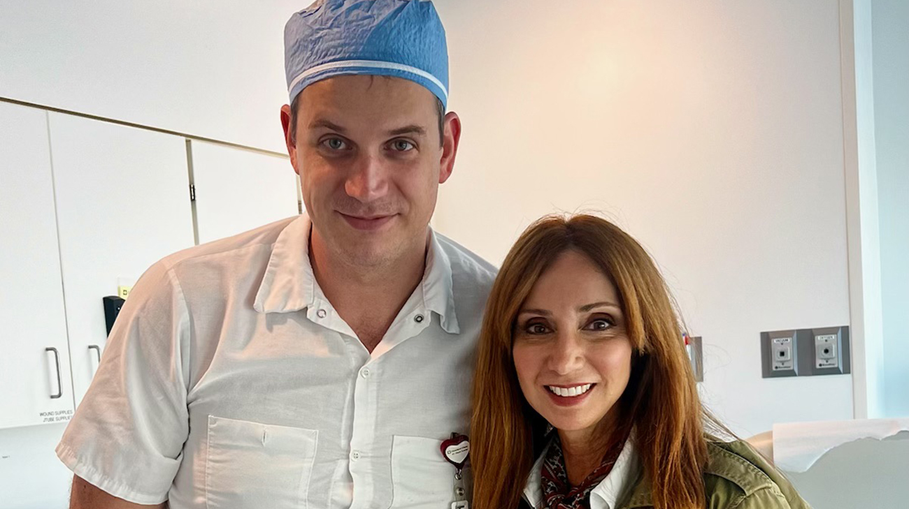 Laurie Apling with Cleveland Clinic cardiothoracic surgeon Marijan Koprivanac, MD.