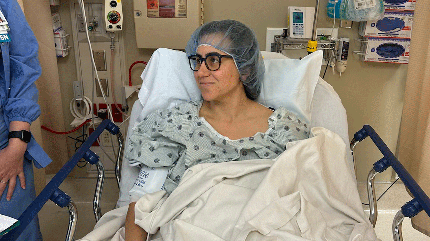 Maria Cedeno prepped before uterine fibroid surgery in a clinical hospital setting.