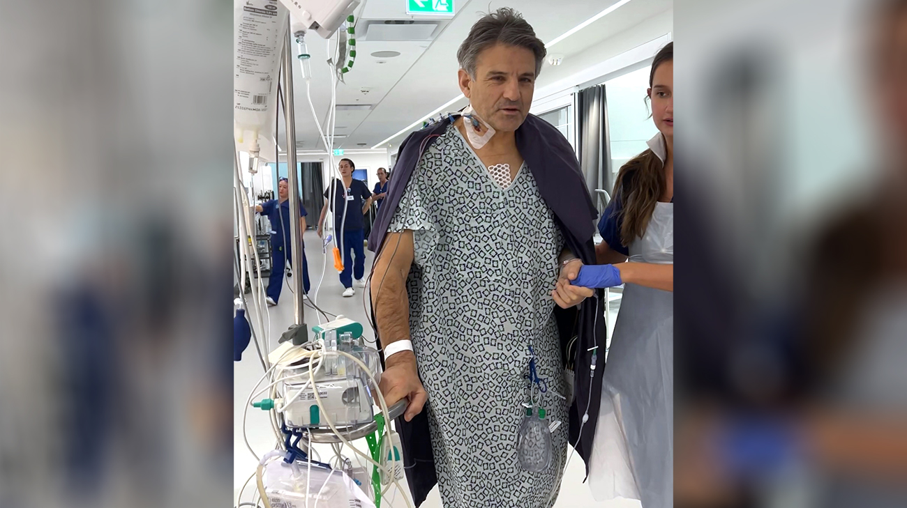 Jeremy walking at Cleveland Clinic London after undergoing heart surgery.