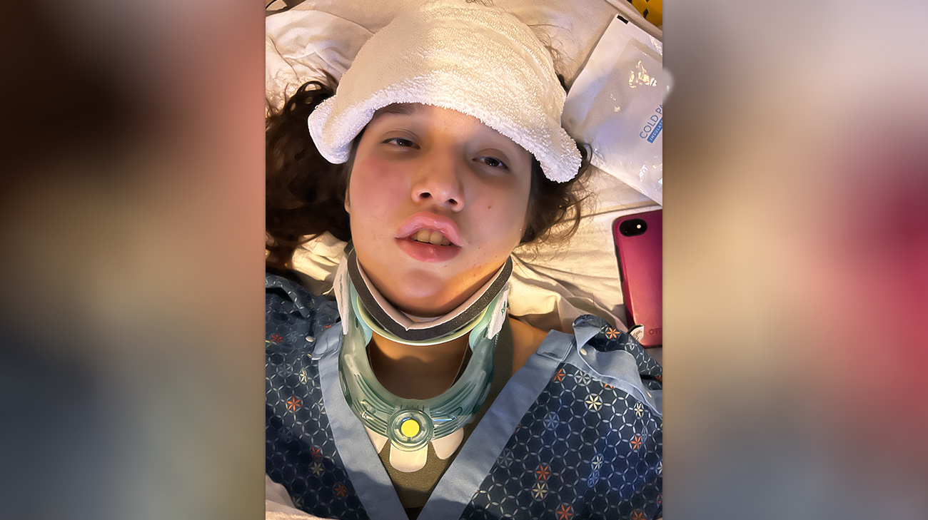 Lucia in the emergency department after falling during an undiagnosed seizure and experiencing a concussion.