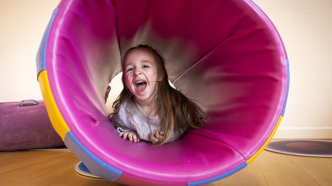 Dani confidently walks into preschool and Cleveland Clinic Children's Center for Autism, comfortably engaging with the people around her.