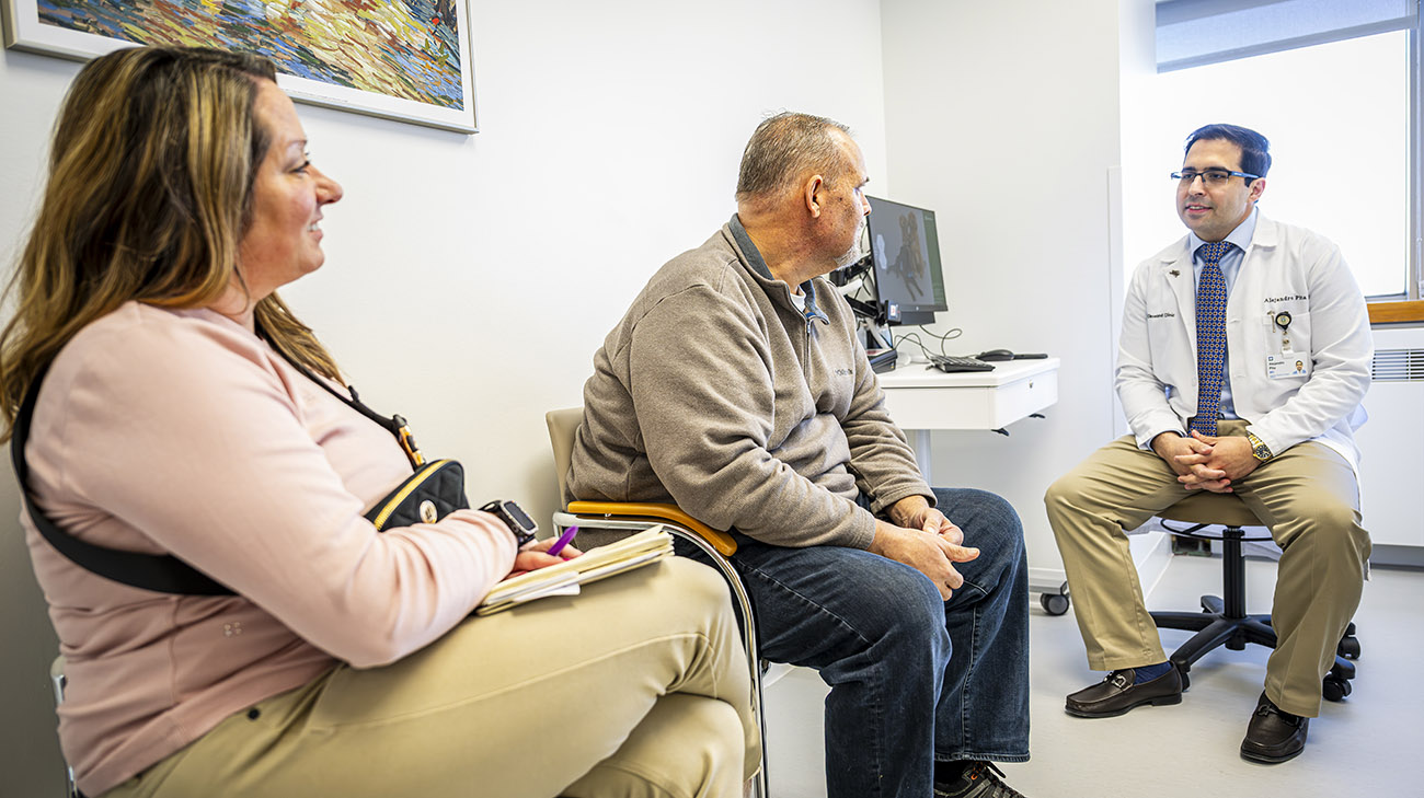 Danny, his wife, Holly, and Cleveland Clinic Director of Living Donor Liver Transplantation and liver transplant surgeon, Alejandro Pita, MD. 